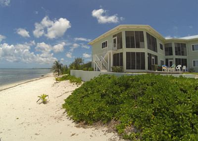 The beach and sea are just a few steps from our first floor vacation rental.